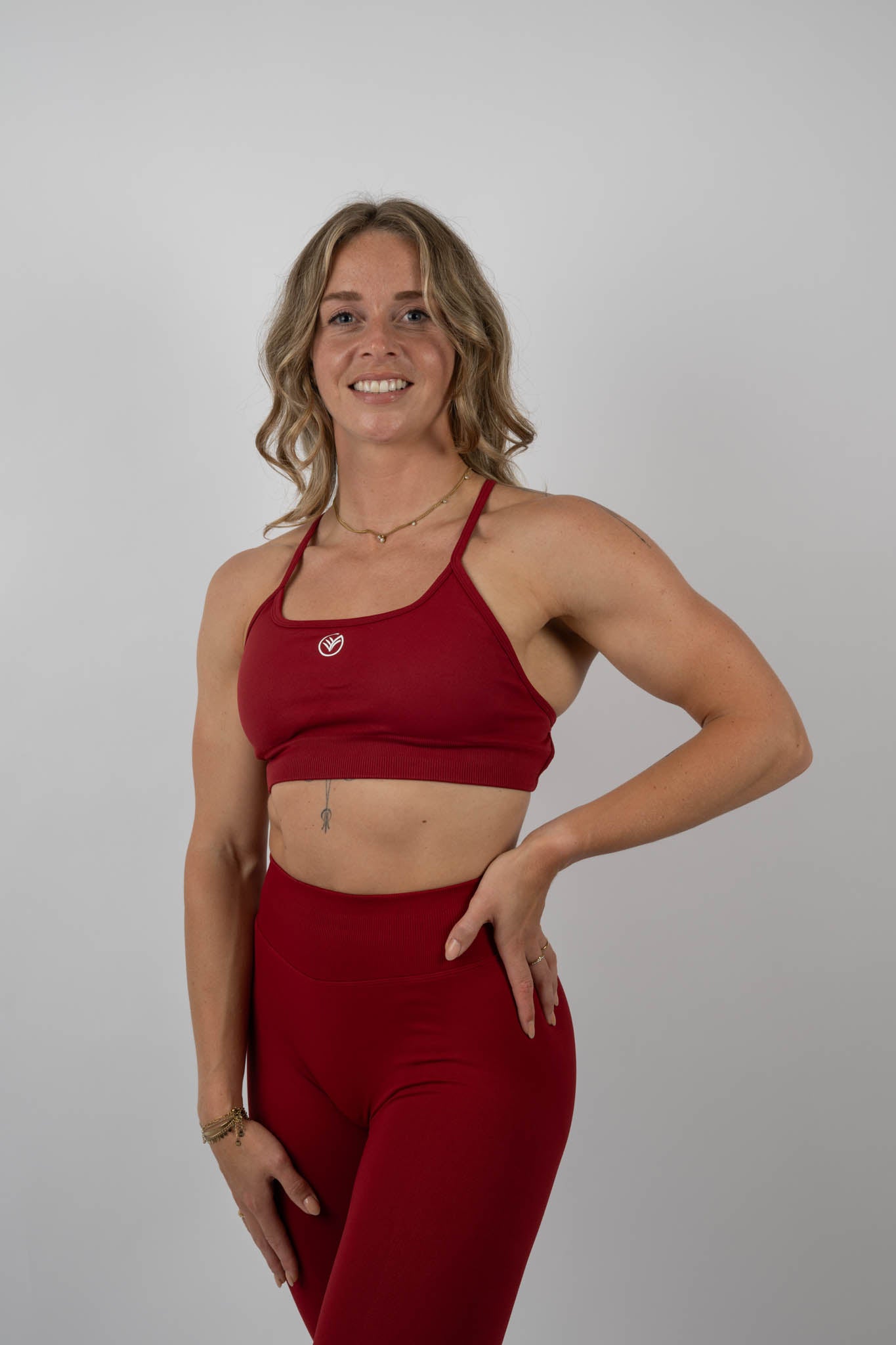 strappy performance sports bra – red | women’s supportive gym bra | galvis sports