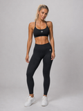 Sujetador cruzado sin costuras y leggings de cintura alta – Negro | Conjunto de gimnasio moldeador | Galvis Sports